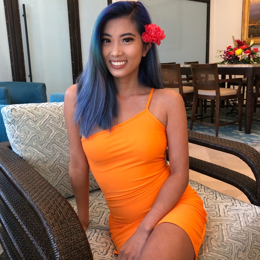 Revolve Superdown one shoulder orange dress.